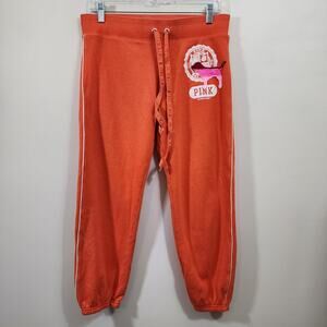 PINK true Y2K orange joggers‎ with spell out on butt woman's size small